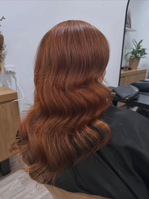 A vibrant copper colour by Revive Hair Lounge